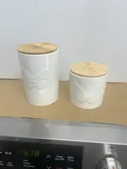 Two Dolly Parton Jars With Lids