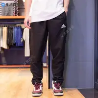 在飛比找Yahoo!奇摩拍賣優惠-Adidas 愛迪達男褲2023夏季新款時尚梭織運動褲寬松透