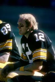 Quarterback Terry Bradshaw Pittsburgh Steelers watches the action- 1976 Photo