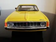 TRAX 1:24 TRL7 1973 VALIANT CHARGER VJ XL SUNFIRE YELLOW. NEW & MIB.