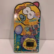 New Dinkie Dino Raku Raku DinoKun Japanese Virtual Pet TK-910 Yellow Tamagotchi
