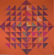 Lily Pad Table Topper Quilt Top 40 x 40 half-square triangles. Orange Sherbert