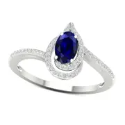 Oval Blue Sapphire and 0.10 CT. T.W. Natural Diamond Flame Spiral Frame Ring in Solid 10K White Gold