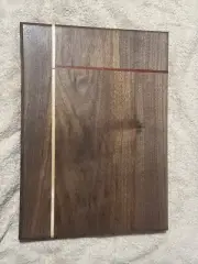 black walnut, maple, and paduk cutting board
