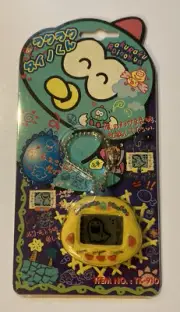 Dinkie Dino Electronic Virtual Pet RakuRaku Dinokun Yellow From Japan
