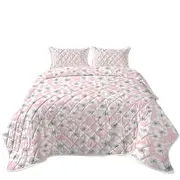 White Floral Drawings over Pink Coverlet