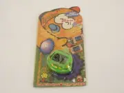New Old Stock Dinkie Dino 24 in 1 Green RakuRaku Dinokun TK-910 Virtual Pet