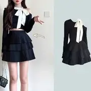 Long-Sleeve Cold Shoulder Two Tone Tie-Up Crop Top / High Rise Plain Accordion Pleated Tiered Mini A-Line Skirt Skirt - Black - M
