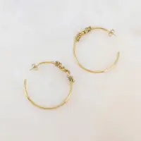 在飛比找momo購物網優惠-【Dinner collection】金圈結綴米玻璃珠耳環