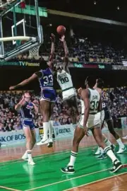 Robert Parish Boston Celtics shoots a layup against Steve Johnson- Old Photo