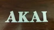 logo AKAI aluminium 15/10eme Dim 126 x 36mm