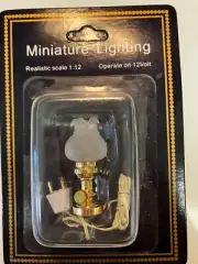 Miniature dollhouse, miniature table lamp with frosted globe in brass