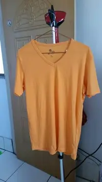 在飛比找Yahoo!奇摩拍賣優惠-全新bossini橘色素面短袖T恤
