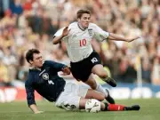 Michael Owen of England is brought down by Christian Dailly of Sco- Old Photo