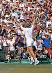 Boris Becker of Germany acknowledges the crowd after losing to Pet- Old Photo