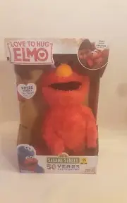 Hasbro Playskool 2018 Sesame Street Love to Hug Elmo Speaks English & Spanish
