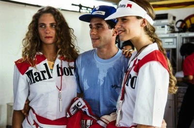 Ayrton Senna with two Marlboro girls in the pits Brazilian GP at A- Old Photo