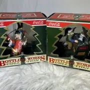 Two Coca Cola Bottling Works Collection Blast Off & Barrel Of Bears Ornaments