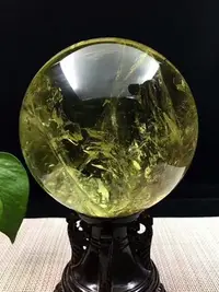 在飛比找Yahoo!奇摩拍賣優惠-幸運星天然水晶  天然巴西黃水晶球12.6cm紫晶綠千層幽靈