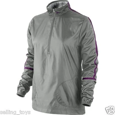 627189-047 New w tag Nike Women Windproof 1/2 zip golf or training Jacket shirt