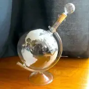 Glass globe decanter with stand and stopper