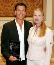 Actor Patrick Swayze and his wife actress Lisa Niemi pose backstag - Old Photo 1