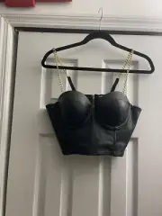 Baby Phat black crop corset with gold chain straps and gold zipper in the back.