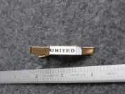 UNITED AIRLINES / UAL CURRENT LOGO ON GOLD TIE BAR.