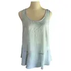 NWOT VInce cumuto peplum light blue and white top size XS NWT