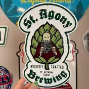 St. Agony Brewing Co Tin Tacker Metal Beer Sign