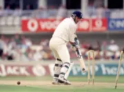 Andrew Caddick of England is out for 15 runs bowled by Shane - Old Cricket Photo