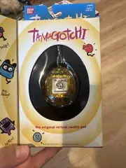 Bandai Tamagotchi Clear teal yellow virtual reality pet 1996-1997 Rare Japan