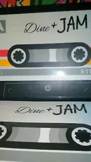 2 SETS OF DINE AND JAM CASSETTE VINYL PLACE MATS. DECORATE FOR A FANTASTIC MUSIC