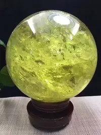在飛比找Yahoo!奇摩拍賣優惠-幸運星天然水晶  天然巴西黃水晶球19.1cm 紫晶綠千層幽
