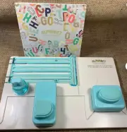 We R Memory Keepers Alphabet Punch Board and Instruction Manual - NEW, no box