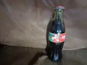 COCA-COLA BOTTLE CHRISTMAS 1995 SANTA ON SOFA COLLECTIBLE 8OZ. UNOPENED BOTTLE