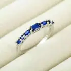 1.30Ct Emerald Cut Lab-Created Sapphire Engagement Rings 14K White Gold Plated