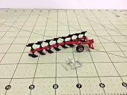 1/64 metal 8 bottom red roll-over plow W/3 point hitch by C&D Models