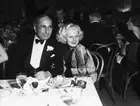 Louis B. Mayer And Jean Harlow Seated 1933 Photo Louis B. Mayer and Jean Harlo