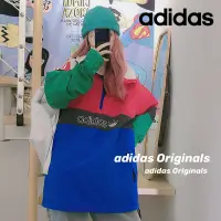 在飛比找蝦皮購物優惠-Adidas100女款梭織運動透氣風衣拼接街頭潮流連帽外套