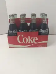 8 Filled Coke Bottles W/ Case