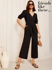 Friends Like These Black Petite Puff Sleeve Zip Front Tie Waist Jumpsuit (979141) | $77