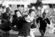New Zealand captain David Kirk breaks away from Philippe Sella of - Old Photo