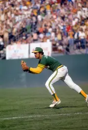 Outfielder Reggie Jackson Oakland Athletics makes a catch in the - 1974 Photo