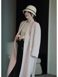 在飛比找樂天市場購物網優惠-秋冬韓系高級長款粉色外套女設計感配腰帶雙面毛呢大衣