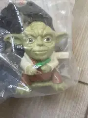 2005 Burger King Star Wars Yoda with light saber. Sealed in original packaging!