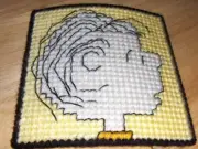 NEW completed plastic canvas magnet - Linus (yellow)