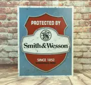 Protected by Smith & Wesson Since 1852 Metal Sign for Man Cave, Garage, or Bar