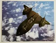SR-71 BLACKBIRD IN THE CLOUDS 8x10 WITH TECHNICAL DATA ON BACK AWESOME PHOTO