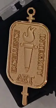 Delta Epsilon Tau honor society pin